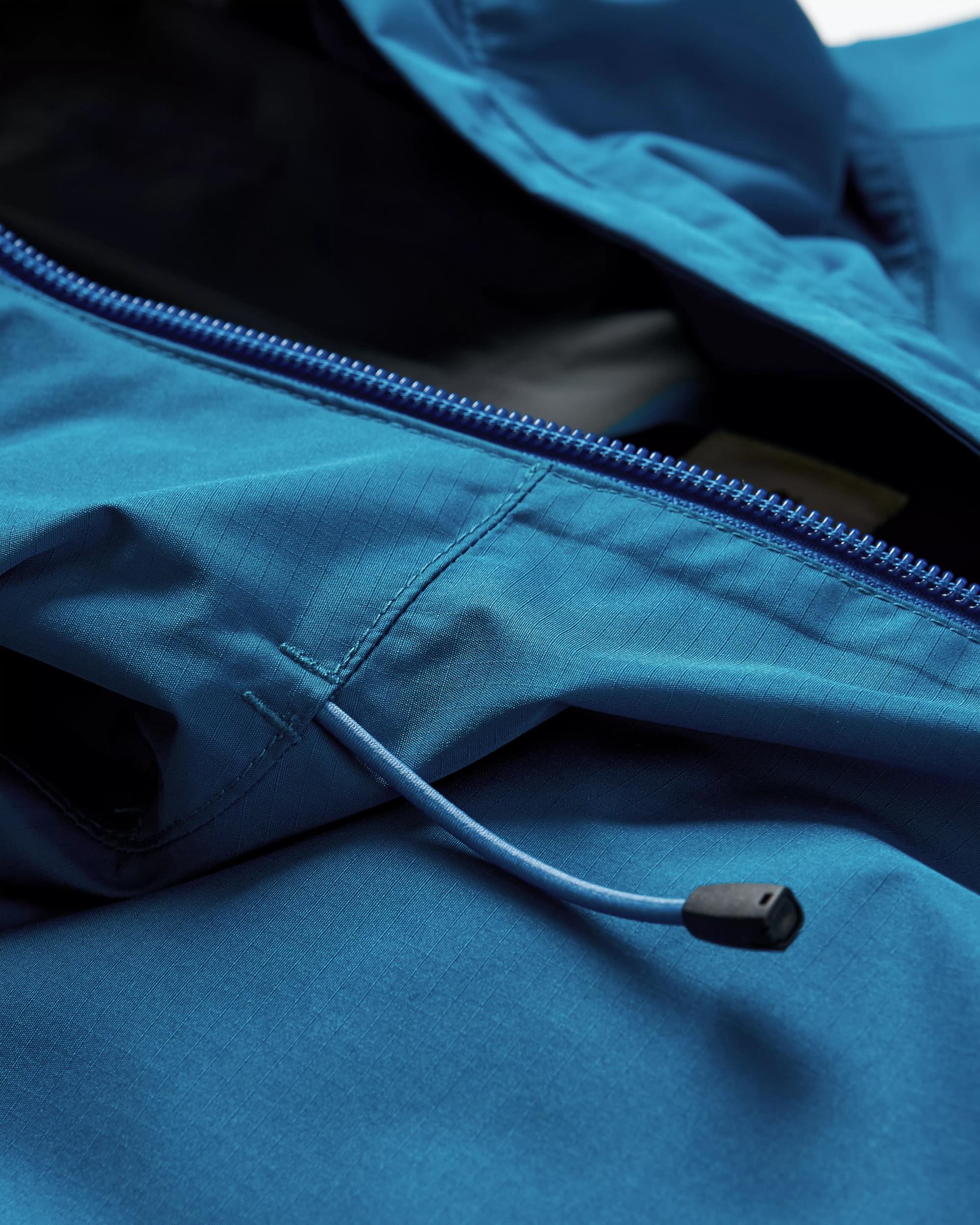 Season Water Resistant Recycled Jacket - Corsair Blue/ Apricot - Flatlay