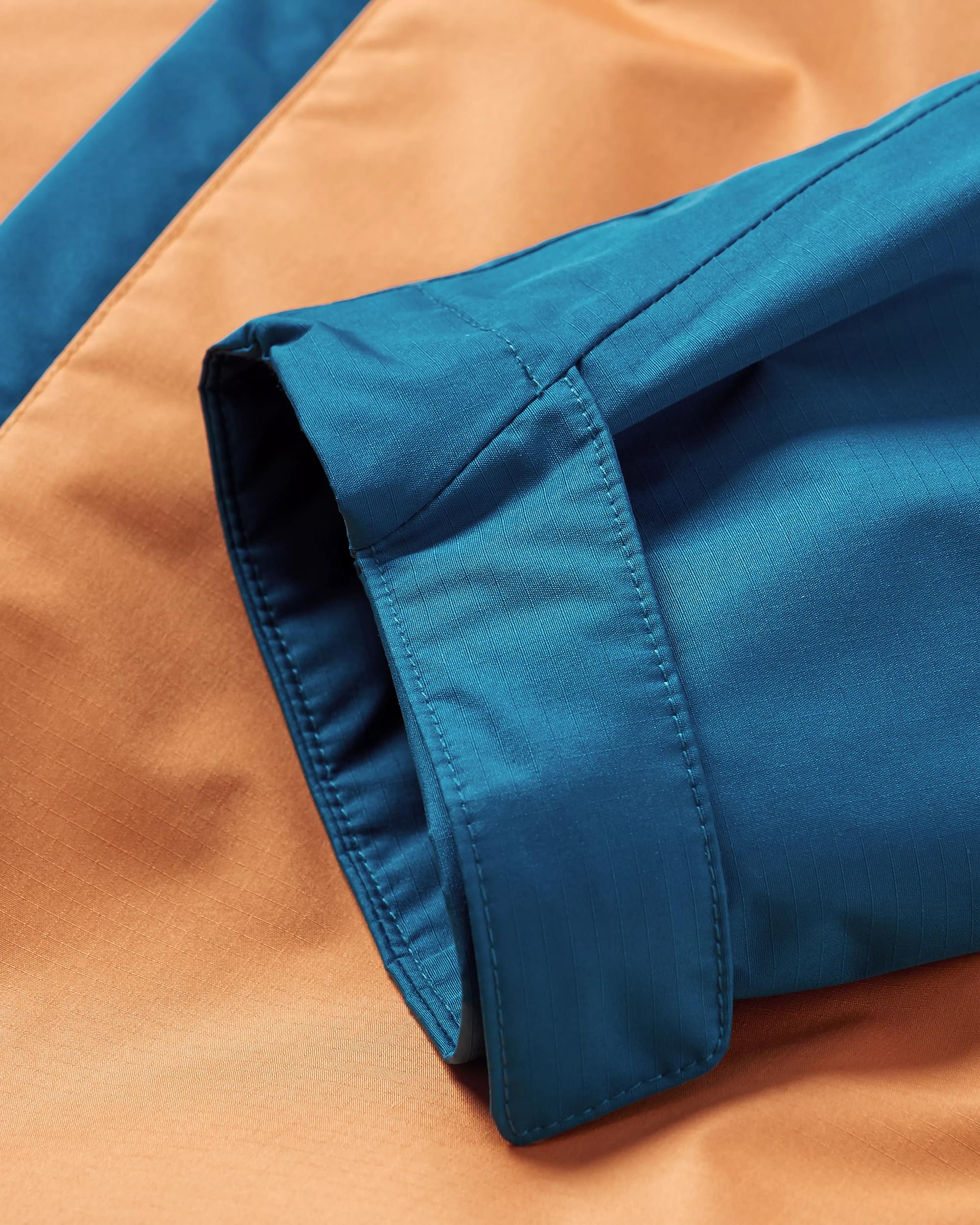 Season Water Resistant Recycled Jacket - Corsair Blue/ Apricot - Flatlay