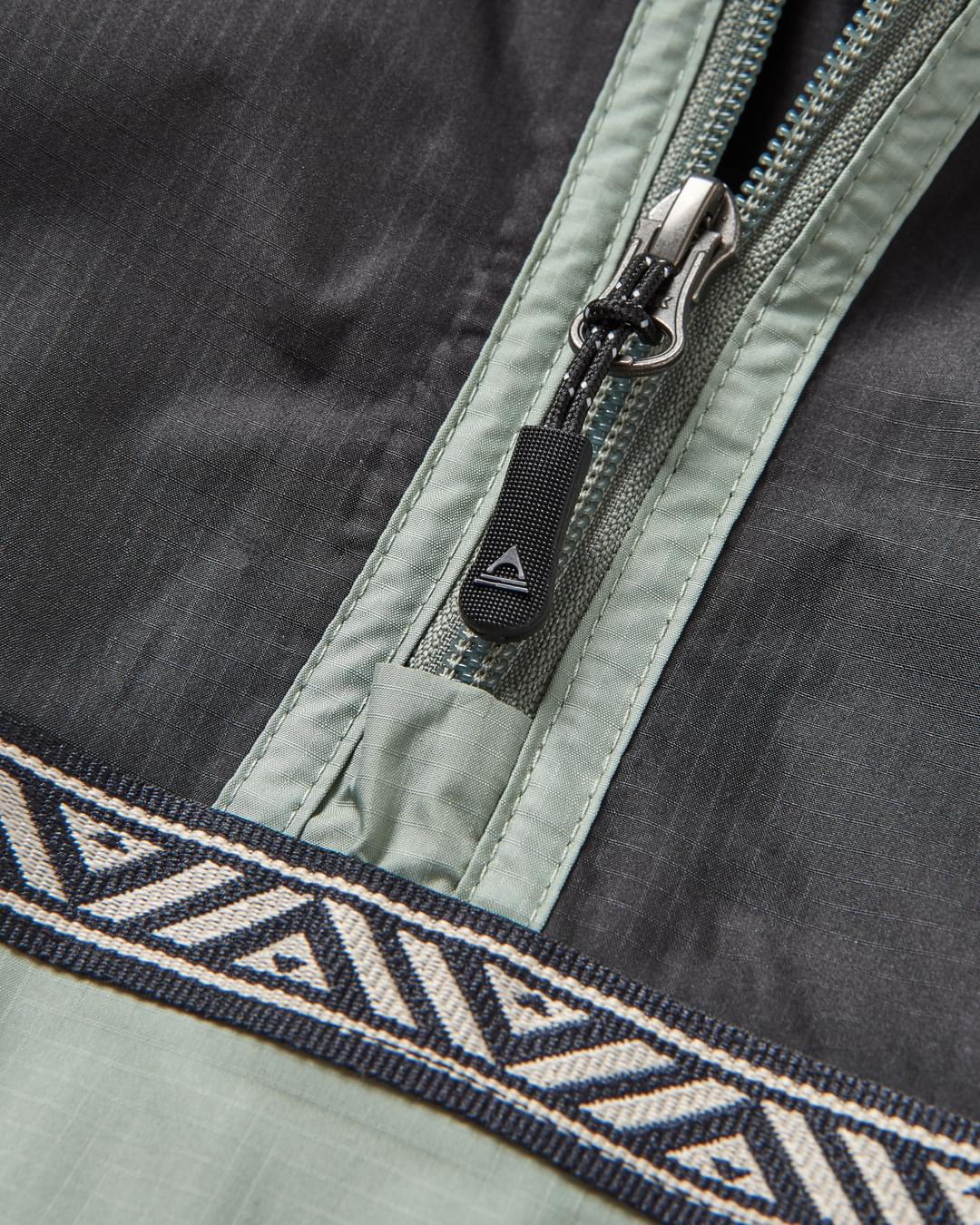 Flow 1/2 Zip Recycled Water Resistant Jacket - True Black/Pistachio - Flatlay