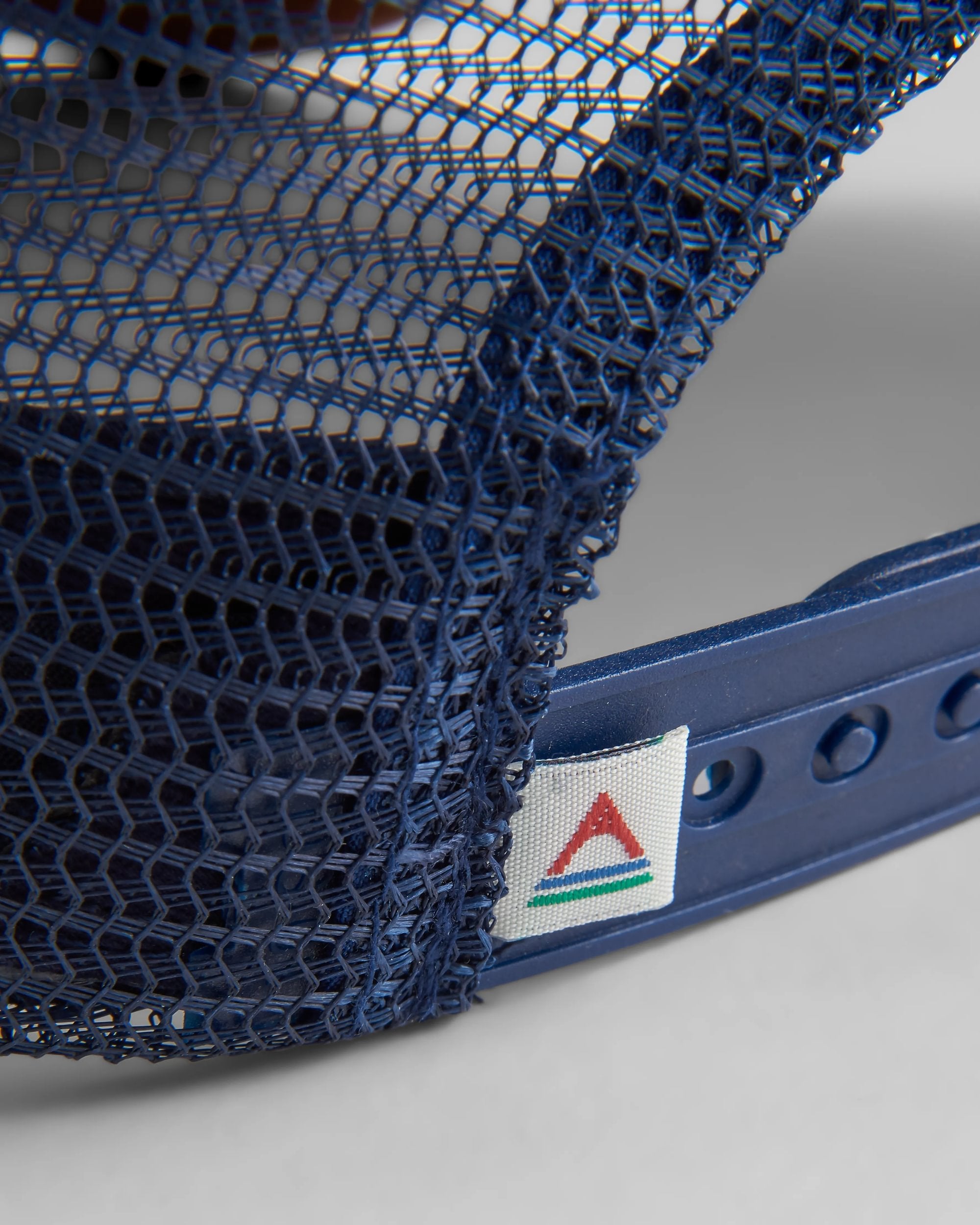 Made To Roam Trucker Cap - Rich Navy/Rubber - Flatlay