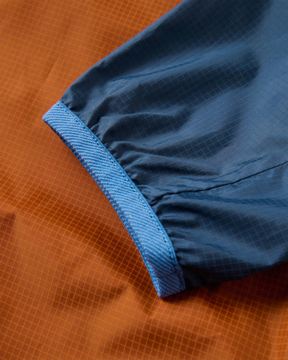 Viento Recycled Windshell Jacket - Dark Denim/Sunset Orange - Flatlay