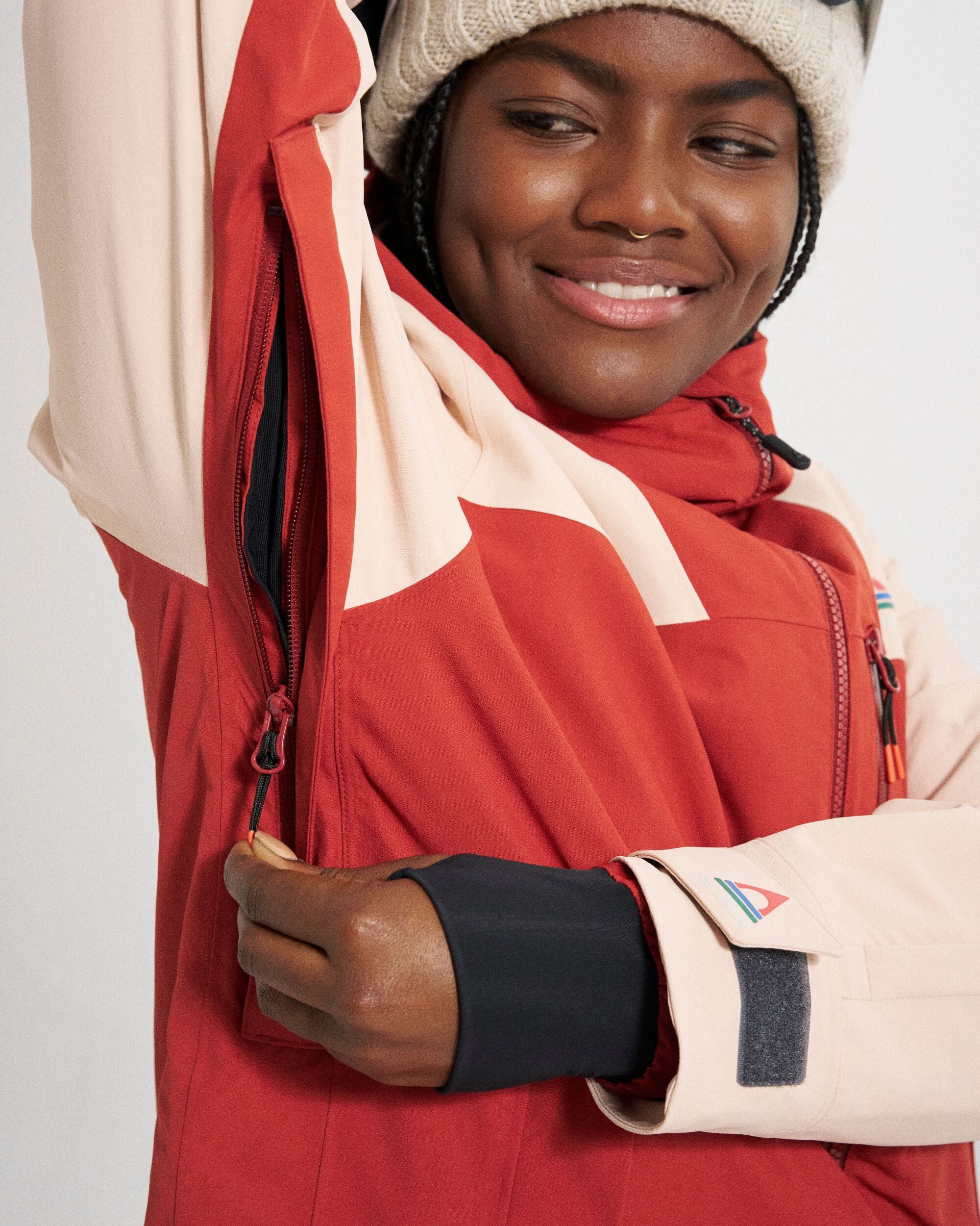 Snowscape Women's Recycled Jacket - Red Ochre/Blush - Studio Model