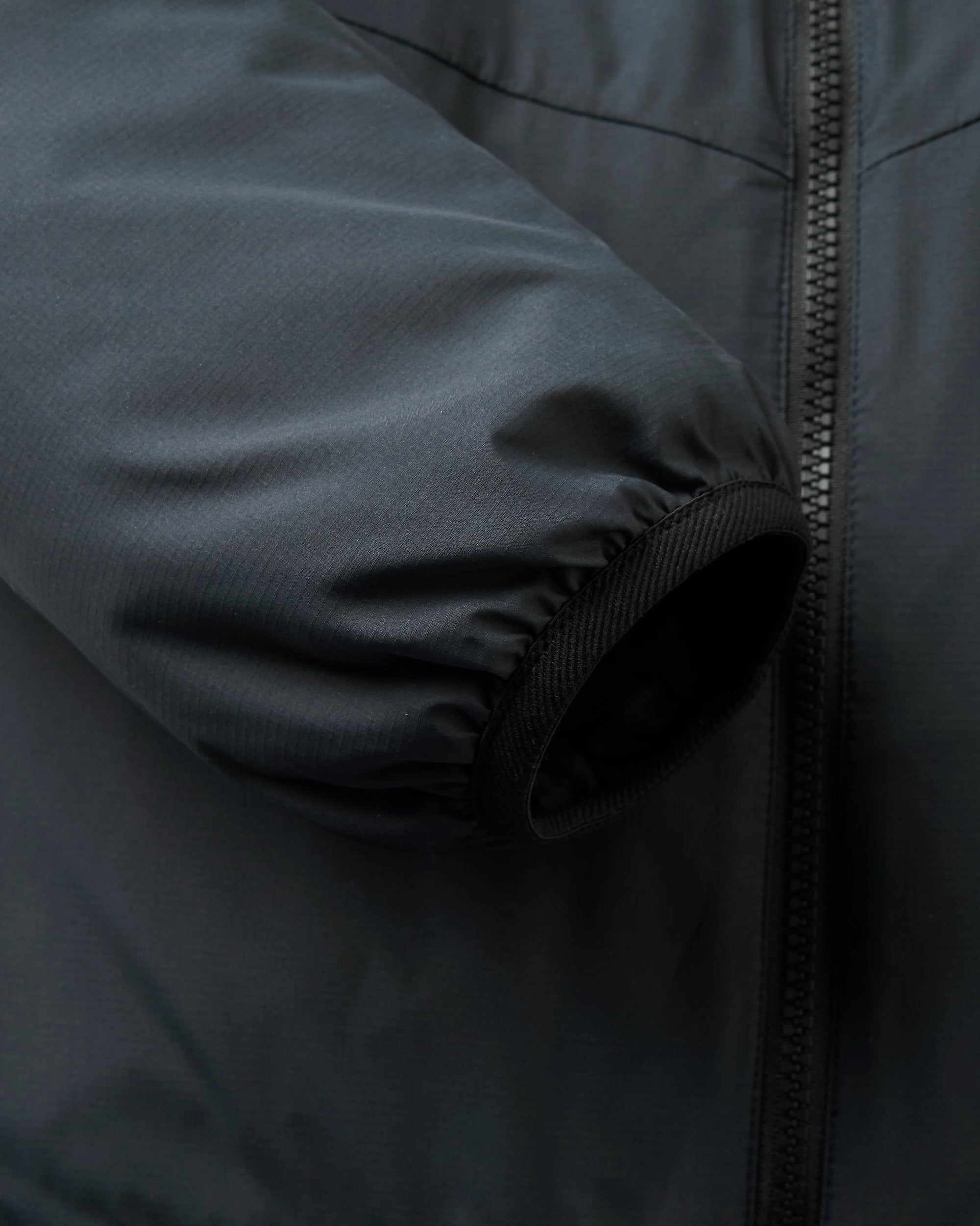Daybreak Lightweight Recycled Thermore® Hoodless Jacket - Black - Flatlay