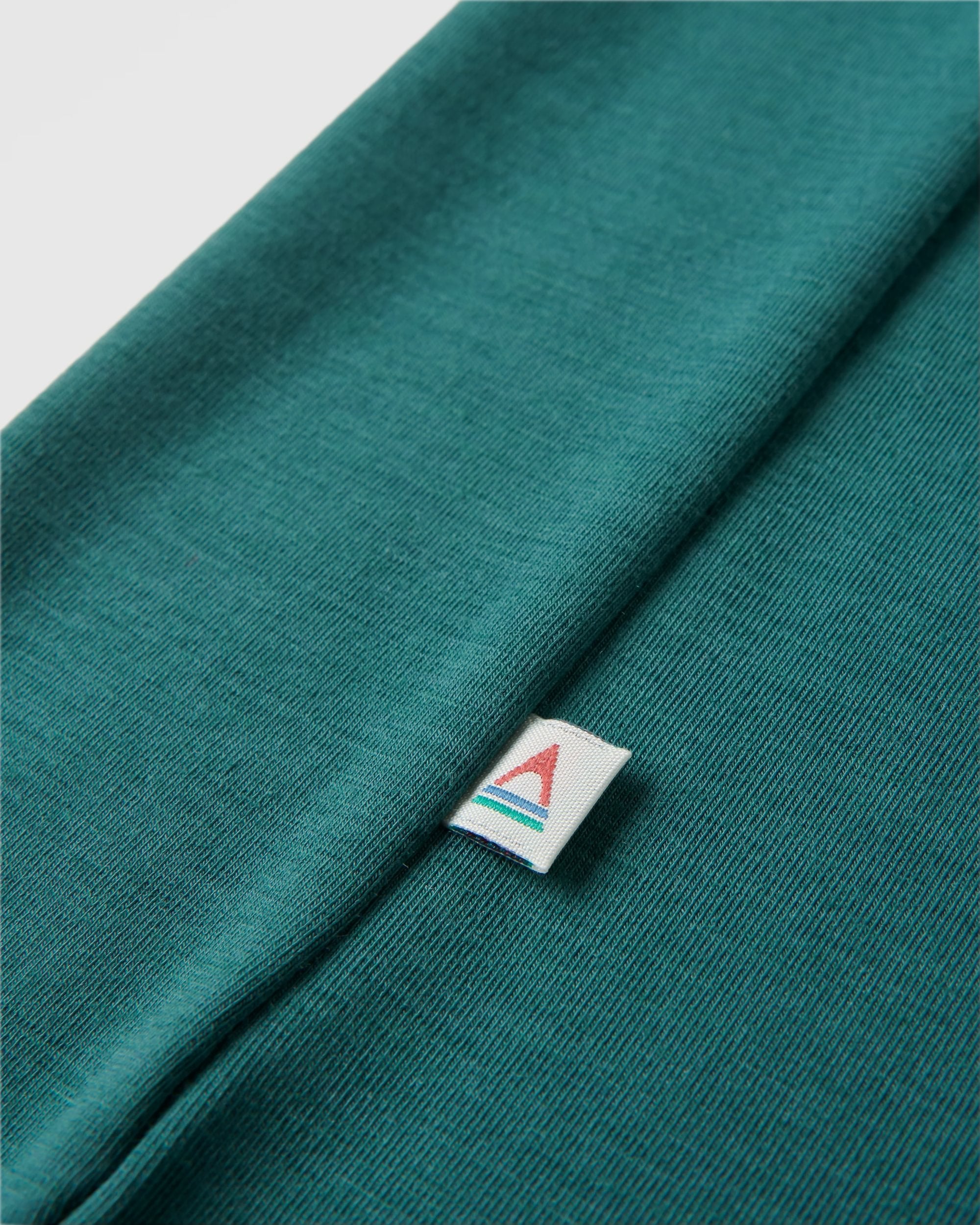 Chase The Light Drirelease® Active T-Shirt - Deep Ocean - Flatlay